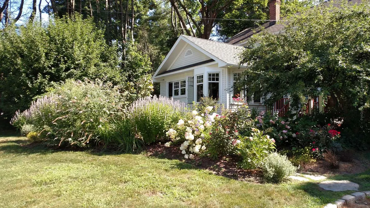 Create a garden: design & planning tips with weatherproof furniture, flowers, pool and more.
