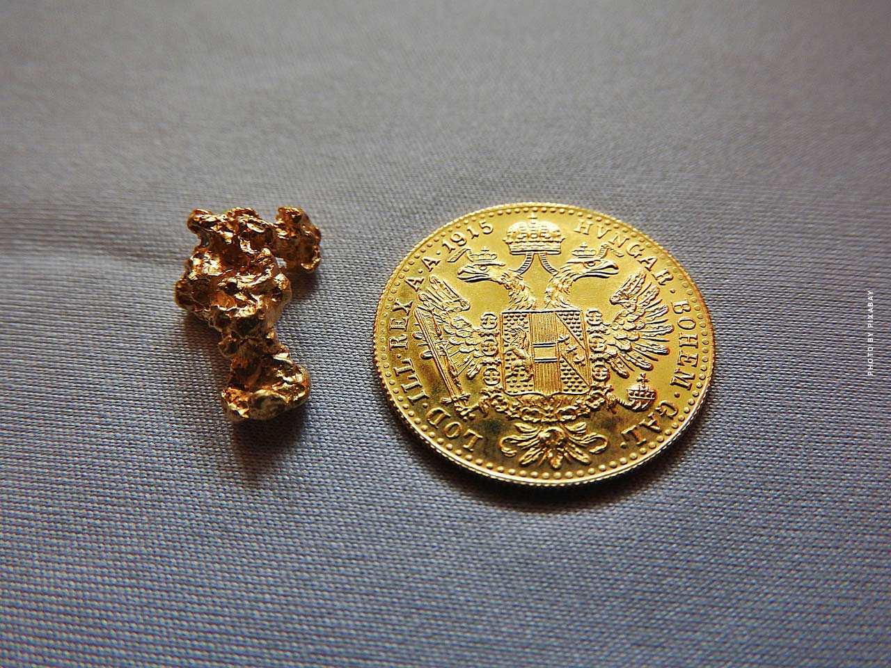 golddukat-gold-nugget-vergleich-gewicht-groesse-aussehen-rohmaterial-muenze-wertvoll-teuer